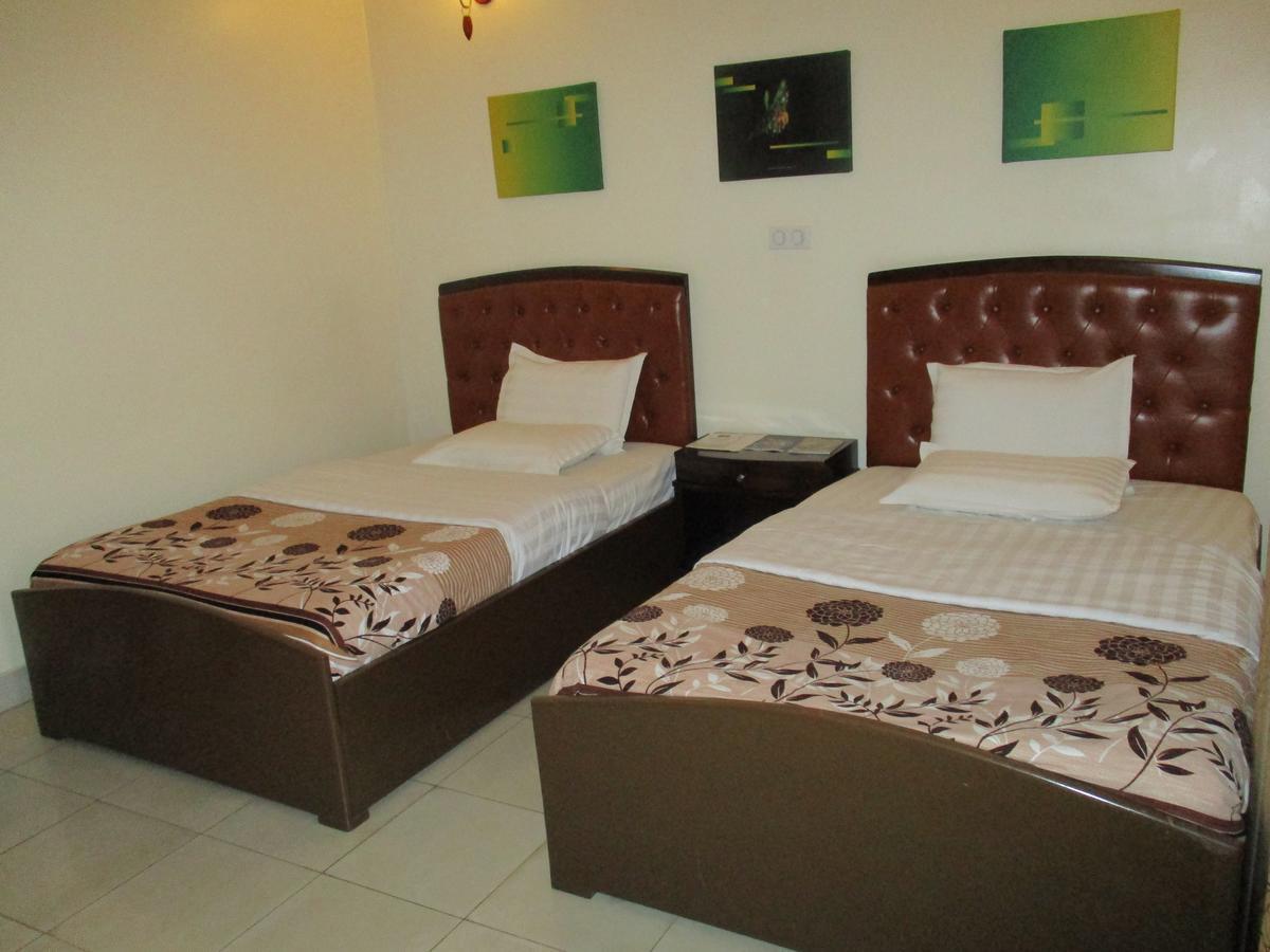 Amaris Hotel Кигали Екстериор снимка